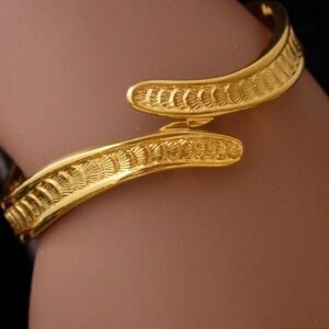 Vintage Monet Bracelet snake wrap bangle hinged gold couture jewelry signed
